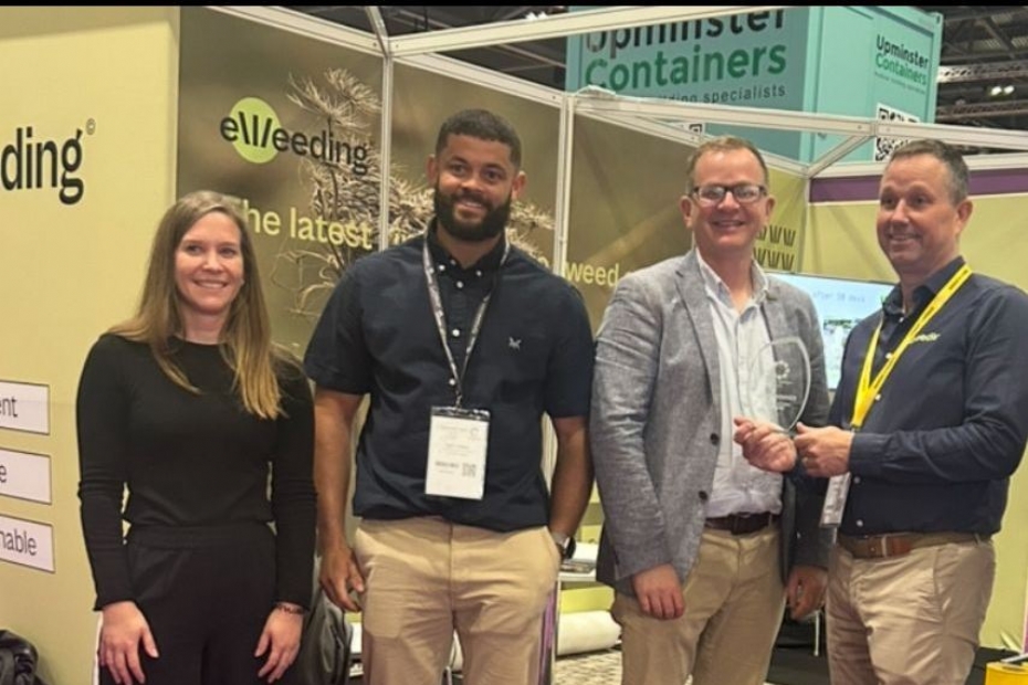 Michel Wimmers (rechts) te midden van de vakjury